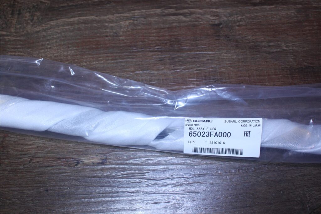 65023FA000 Subaru OEM Front Window Upper Moulding