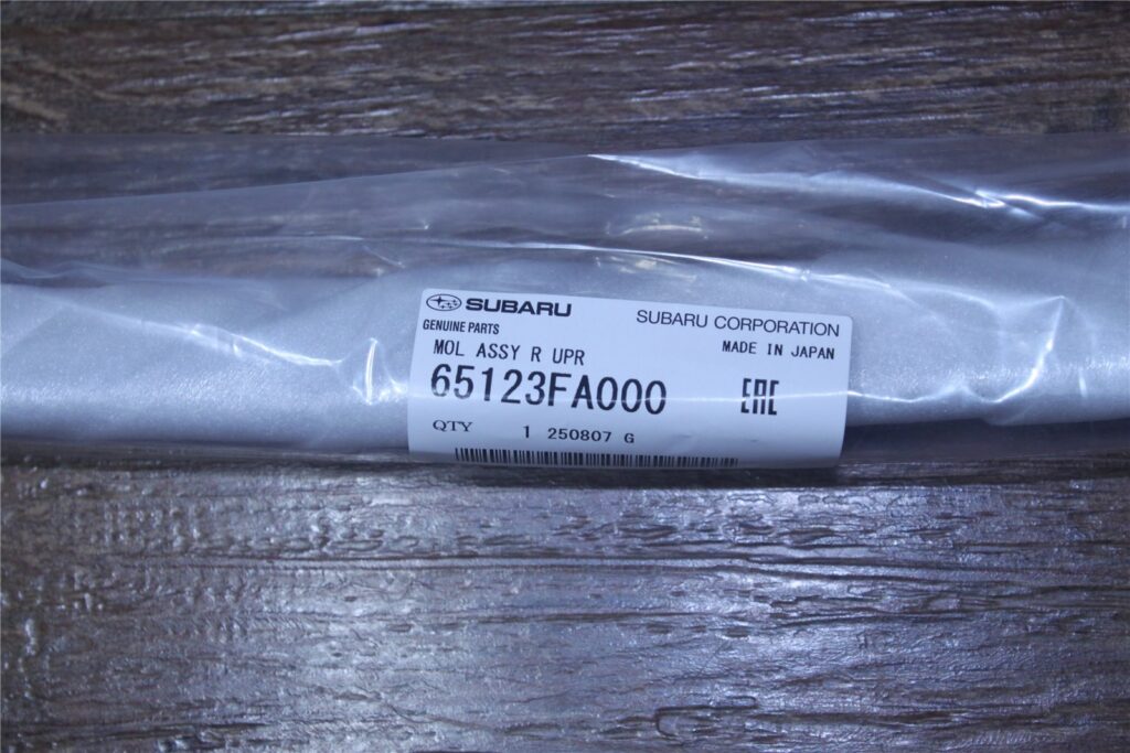65123FA000 Subaru OEM Rear Window Upper Moulding