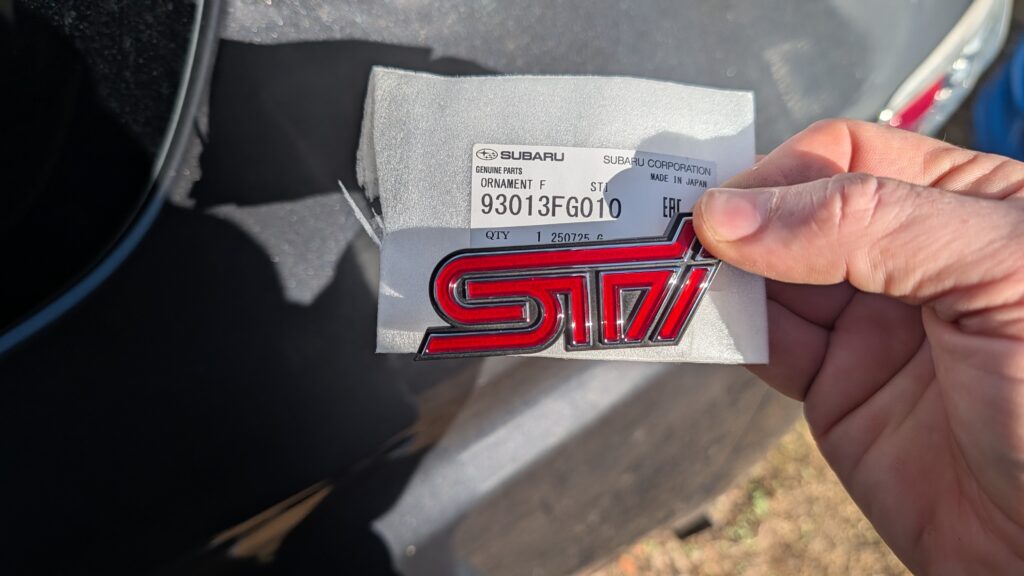 93013FG010 Subaru OEM STI Front Ornament
